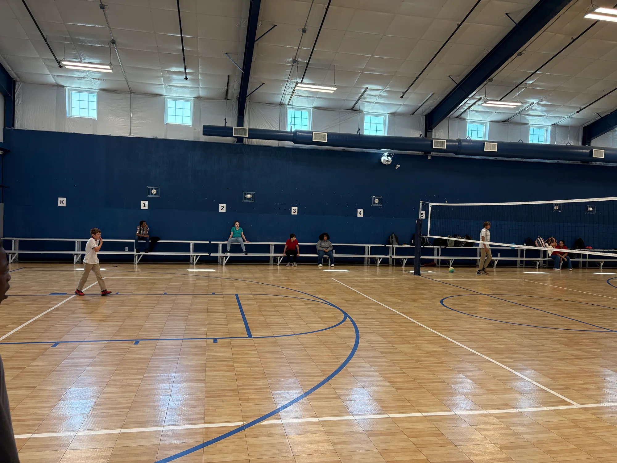 Students playing in the gym at Wayne Preparatory Academy